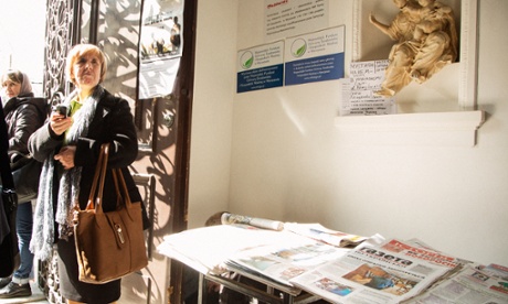 Ukrainian newspapers for sale in the church after Sunday mass.