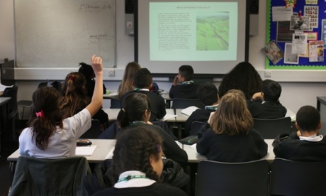 School students take part in a geography lesson at a secondary school in London.