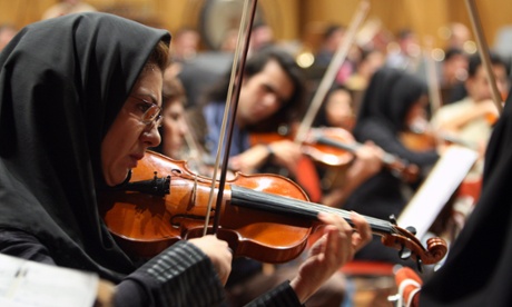 Tehran Symphony Orchestra musicians rehearse in 2010, before the orchestra was disbanded for lack of funds in 2012.