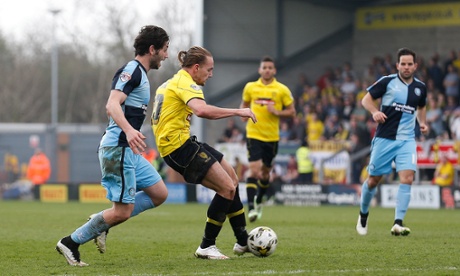 Adam McGurk curls the ball past Ingram to put Burton Albion ahead.