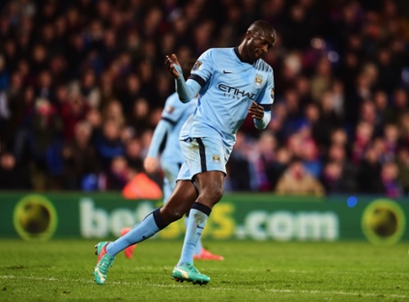 Yaya Toure celebrates his goal to put City back in the game.