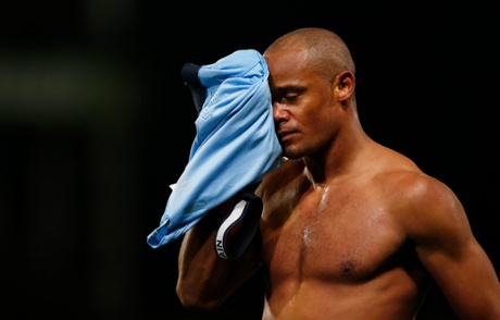 Vincent Kompany walks off dejected at the end of the game as City's defence of the title looks over.