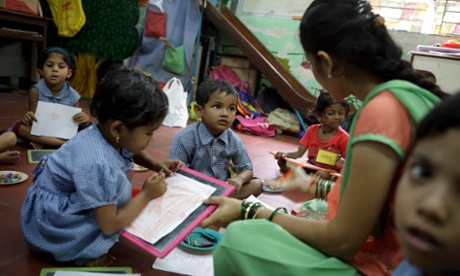 Students study during a program run by NGO at Colaba Primary Municipal School  in Mumbai, India
