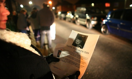 Local residents distribute posters as they start their second night of searching for missing nine-year-old Shannon Matthews