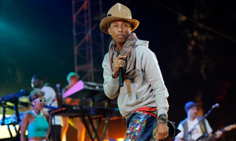 Pharrell Williams battles a sand storm at Coachella.