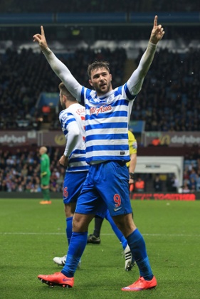 Charlie Austin celebrates scoring his side's third.