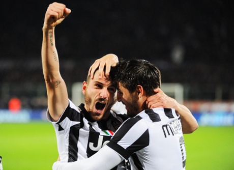 Juventus' Leonardo Bonucci celebrates with his teammate Alvaro Morata after scoring the 3rd.