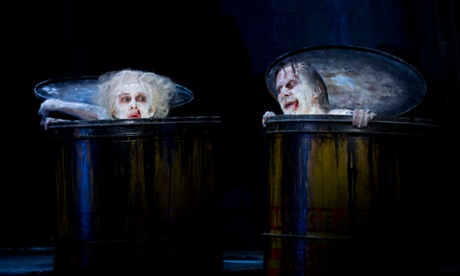 Sarah Peirse and Bruce Spence, playing Nell and Nagg, pop out of their trashcans.