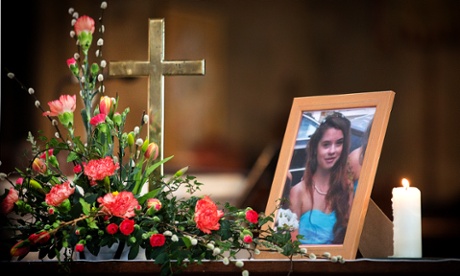 A candle burns beside a photograph of Becky Watts at St Ambrose church in Bristol, where her funeral will be held on 17 April.