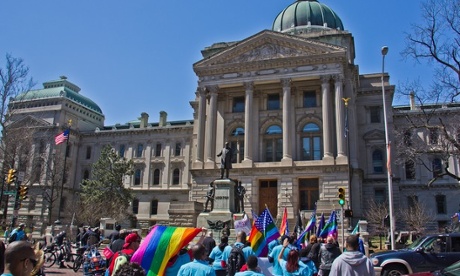 Hundreds of people calling for Indiana to add protections for gays and lesbians to the state's civil-rights laws marched through downtown Indianapolis on Saturday April 4th, 2015