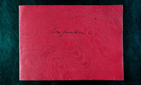 The red notebook in which the future Queen Victoria wrote about 12-year-old Alice displayed in the Royal Archives at Windsor Castle.
