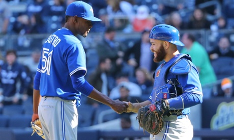 Russell Martin is all smiles, greeting Toronto Blue Jays relief pitcher Miguel Castro after an Opening Day win against the New York at Yankee Stadium.