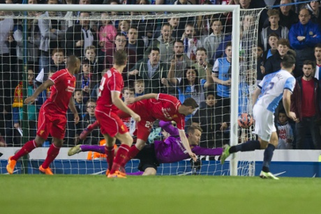 Simon Mignolet saves from Ben Marshall.