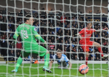 Philippe Coutinho scores the opening goal.