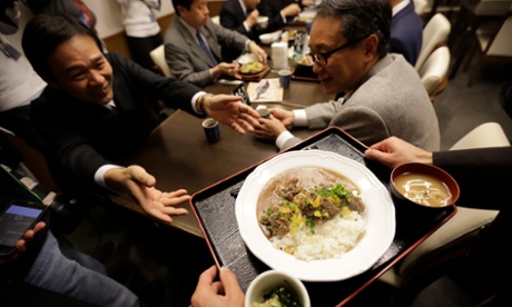 Whale curry is served to government officials at a conference in Tokyo, Japan.
