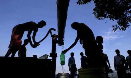 taking water from a tap