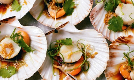Steamed scallops in the shell with ginger, soy, sesame oil and spring onions.