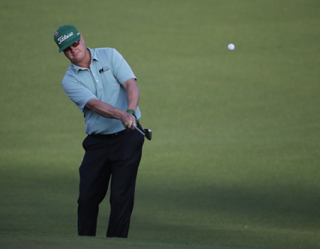 Charley Hoffman chips on the first fairway.