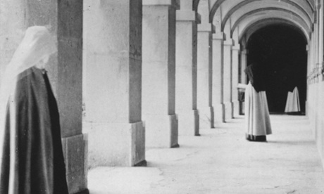 Nuns in the cloisters of their nunnery.