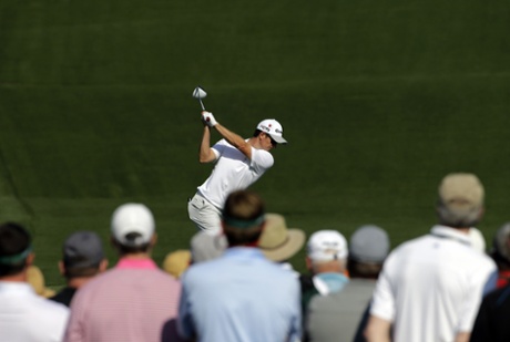 Justin Rose, of England, tees off.