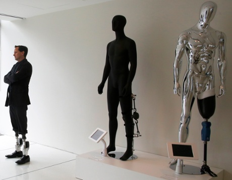 Hugh Herr with examples of the bionic limbs his lab has developed at the Massachusetts Institute of Technology.