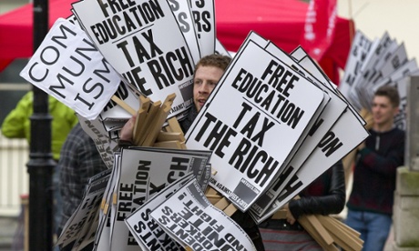 Placards being carried in preparation for a student march