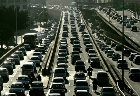 Vehicles crawl along a major road in São Paulo, Brazil.