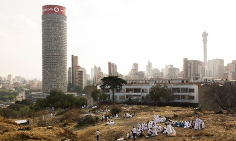 Prayer gatherings in the Hillbrow neighbourhood, overlooked by the Ponte tower, in 2014.
