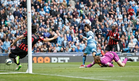 David Silva scores the sixth.