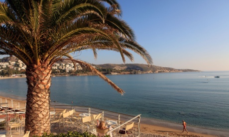 Vouliagmeni beach near Athens. There is a striking disconnection between the blithe lack of concern felt by much of the public and the seriousness of Greece’s economic plight.