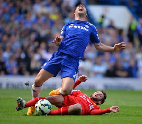 Adam Lallana fouls Branislav Ivanovic.