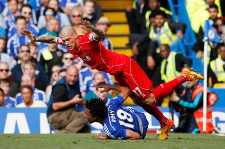 Martin Skrtel takes out Loic Remy.