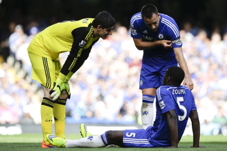 Kurt Zouma lies on the ground injured