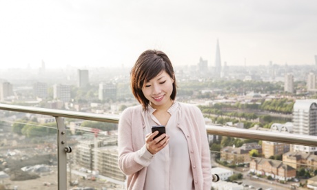 Woman looking at her mobile phone