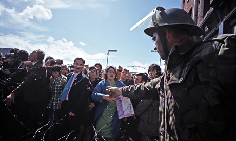 The British Army face protesters in West Belfast in 1981.