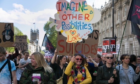Protesters wave banners and placards at 9 May anti-Conservatives demonstrations.