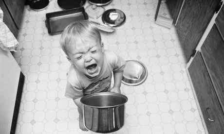 Baby boy screaming with saucepans on the floor