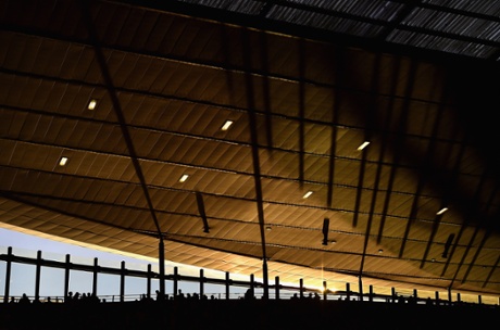 The evening sunlight is seen creeping through the stand at the Emirates.