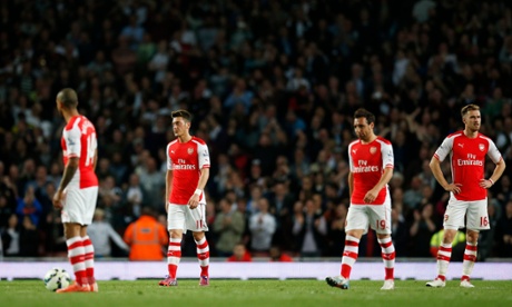 Arsenal dejected after Swansea's goal.