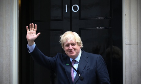 London mayor Boris Johnson arrives at Downing Street on Tuesday as David Cameron announced his new cabinet.