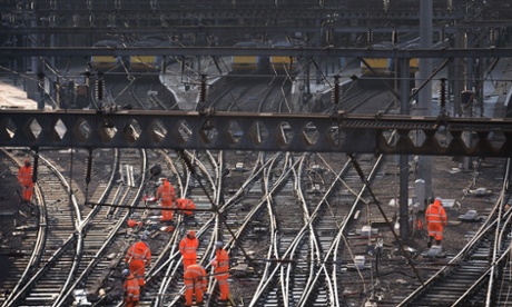 Railway workers on the tracks outside King's Cross, London.