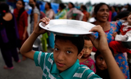 Food distribution at a refugee camp in Kathmandu