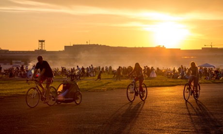 Visitors relax and enjoy barbecues beside the former runway of Tempelhof airport.