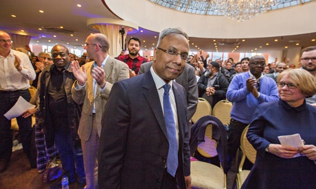 Lutfur Rahman is applauded at a rally in support of him after he was removed from office by an elect