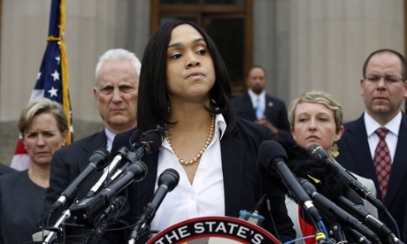 Marilyn Mosby, Baltimore state's attorney announces criminal charges against all six officers suspended after Freddie Gray suffered a fatal spinal injury while in police custody.