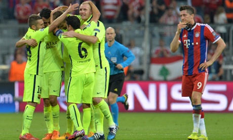 Some of the Barcelona players celebrate their victory whilst Bayern's Robert Lewandowski thinks of what might have been.