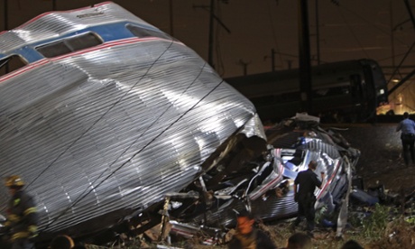 Emergency personnel work at the scene of the crash in Philadelphia.