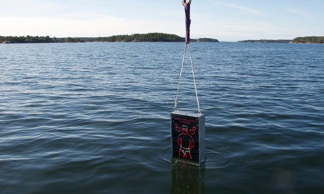 the device being lowered into the water