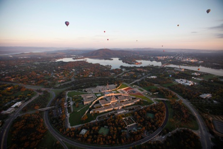 View of Parliament House from a hot air balloon. The building is integrated within the hill in order to put ‘the people above the parliament’.