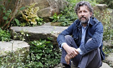 Dan Pearson sitting in his garden